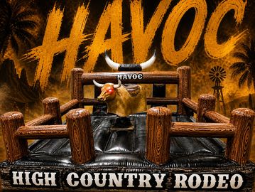 Mechanical bull ride setup at High Country Rodeo with Havoc branding.
