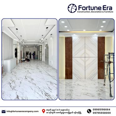 Modern interior under construction with marble flooring and ceiling lighting.