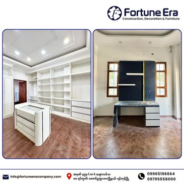 Modern custom-built white shelves and a desk with black paneling in a bright room.