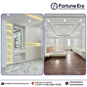 Modern interior design with white cabinets, marble flooring, and sleek lighting.