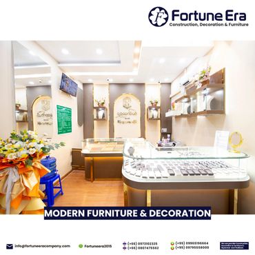 Bright, modern jewelry showroom with elegant display cases and floral decorations.