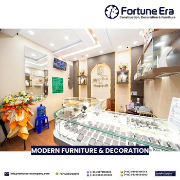 Modern jewelry store interior with bright lighting and elegant display cases.