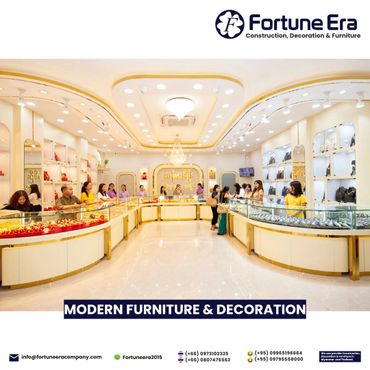 Luxurious modern jewelry store interior with elegant lighting and display cases.