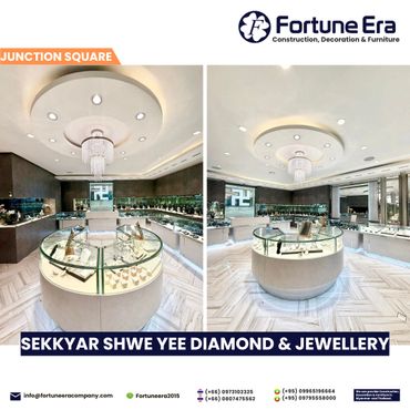 Modern jewelry store interior with elegant lighting and glass displays.