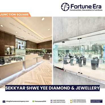 Modern jewelry store interior with elegant displays and bright lighting.