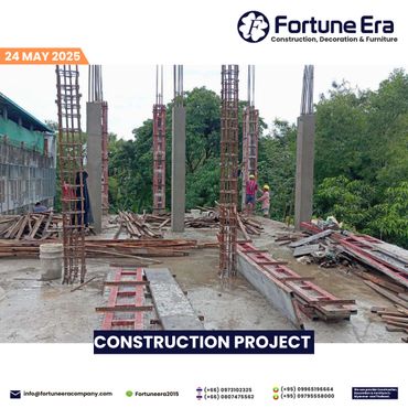 Construction site with concrete pillars and workers, dated May 24, 2025.