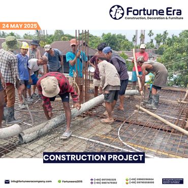 Construction workers pouring concrete on a building site in a team effort.