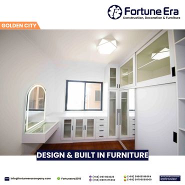 Modern white custom-built furniture in a sleek, bright room with wooden flooring.