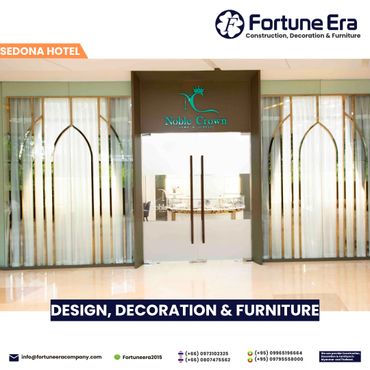 Elegant glass storefront with gold accents at Sedona Hotel by Fortune Era.