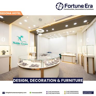 Elegant jewelry showroom with modern lighting and elegant display cases.