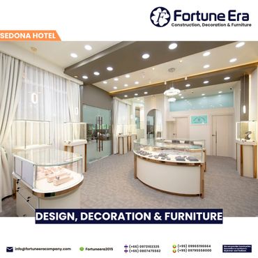 Modern, well-lit jewelry showroom with elegant display cases and soft neutral tones.