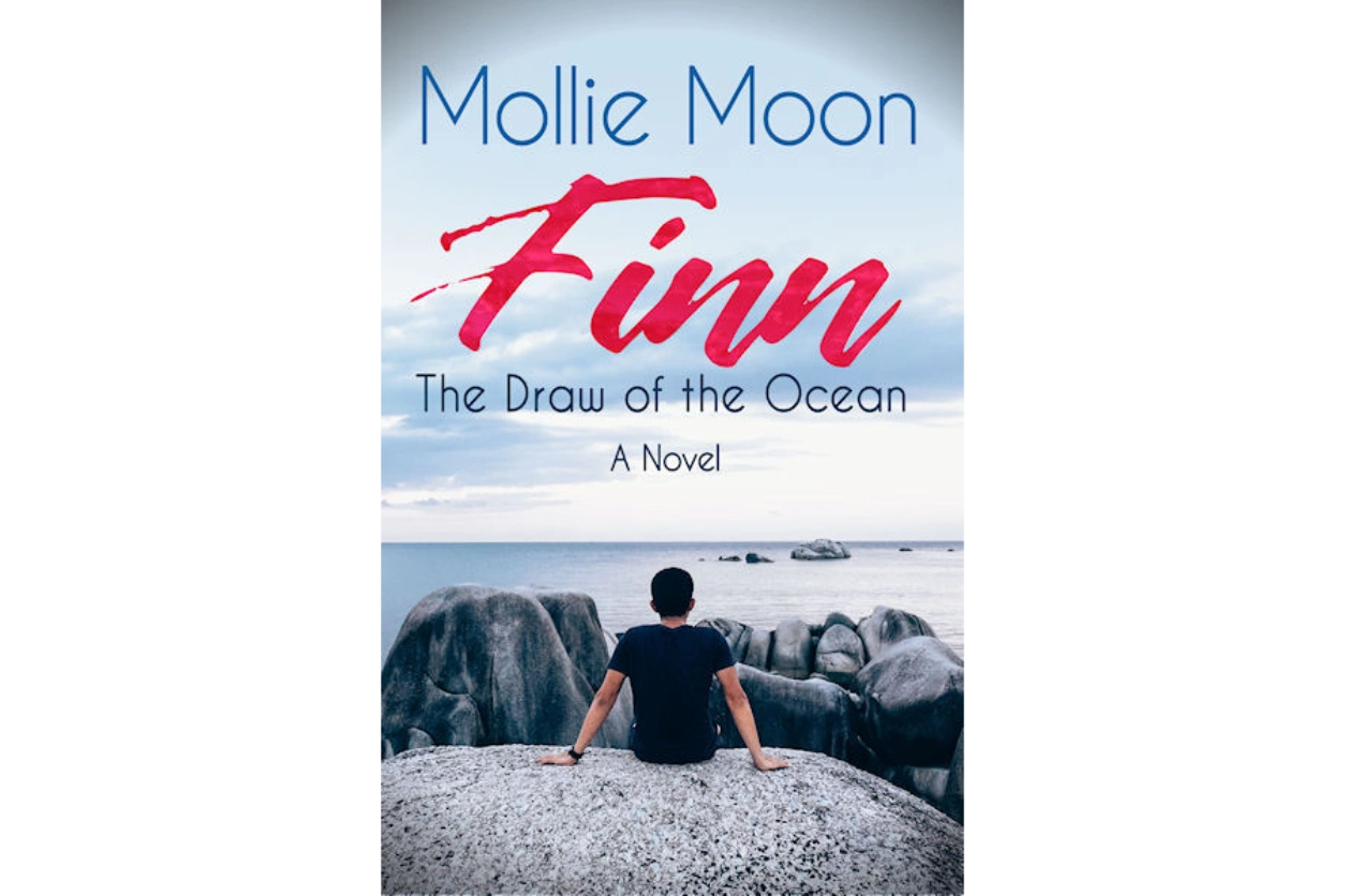 Mollie Moon book cover for Finn - The Draw of the Ocean featuring a man on a rock looking out at sea