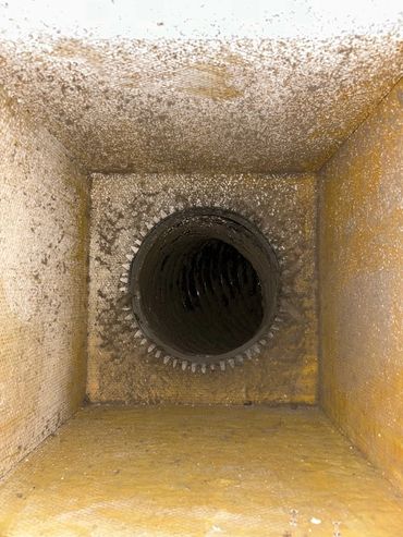 Inside view of a dirty ventilation duct.