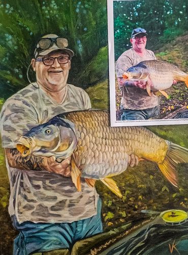 Man proudly holding a large fish in a natural setting.