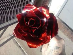 Hand Sculpted and Cut Red Steel Rose