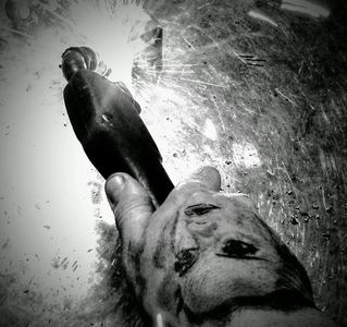 This is the hand of the Artist, Will Reddington, Welding with Sparks