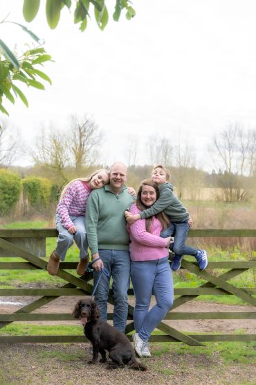 Family photography: two children and parents with dog at Hodsock Priory