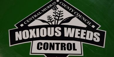Central Murray Country Council Noxious Weeds Control logo design for signage. Black & white on green