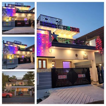 Modern two-story house with colorful lights and elegant design.