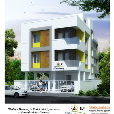 Modern residential building with white and yellow accents in a green environment.