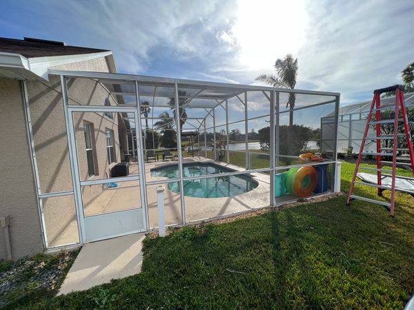 Pool Screen Enclosure side wall screened in with standard screen mesh 18x14 panels.