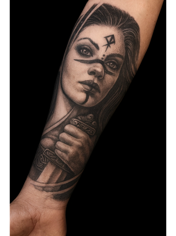 Black and grey tattoo of a woman holding a sword.