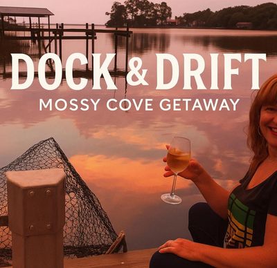 Woman enjoying a drink on a dock at sunset with calm water and trees.