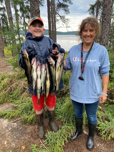 two fishing friends with 7 blue walleye