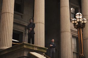 Two brothers standing in front of Chicago building