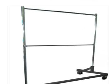 Metal clothing rack with wheels.