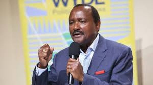 A man speaking passionately while holding a microphone.