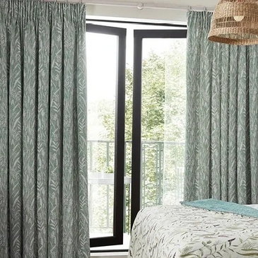 duck egg bedroom with patio doors and floor length curtains