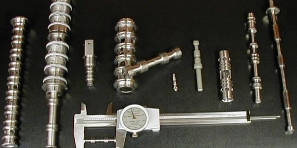 Aerospace hydraulic valve assemblies