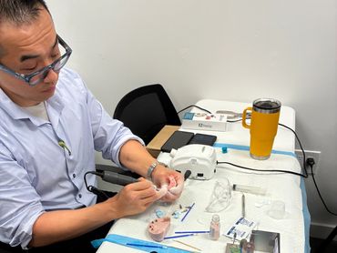 James Han of precision esthetics during his hands on denture conversion course by zimvie palm beach