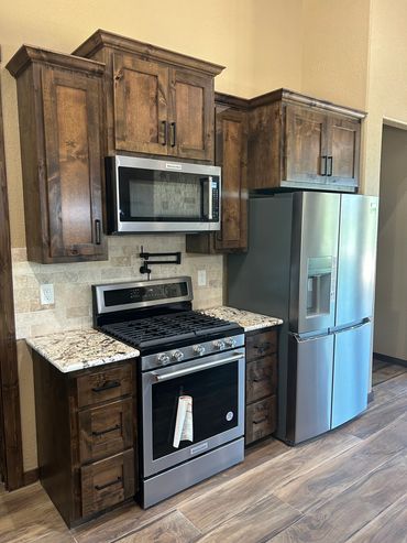 Knotty Alder kitchen with walnut stain