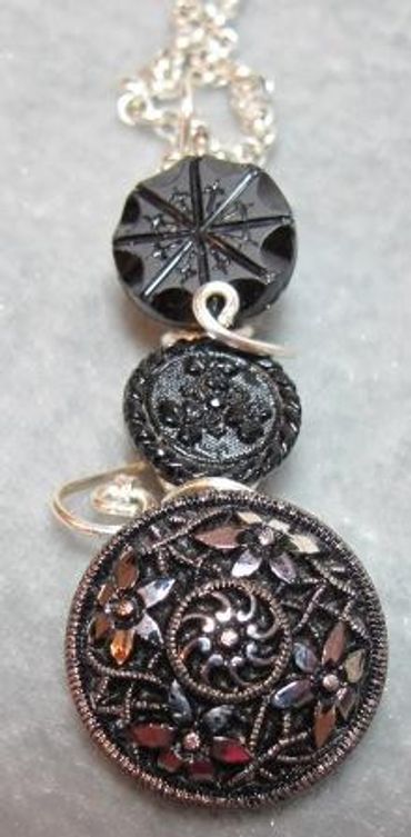 Stunning silver lustre black glass, pressed black black and cut black glass buttons - Victorian era