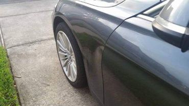 Top Repair BMW Before - Florida Dent Solutions
