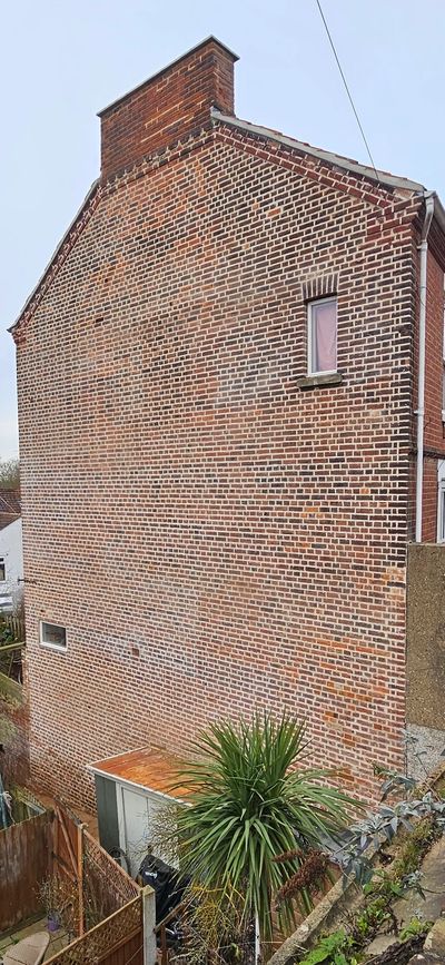 Gable end was has been repointed in lime mortar