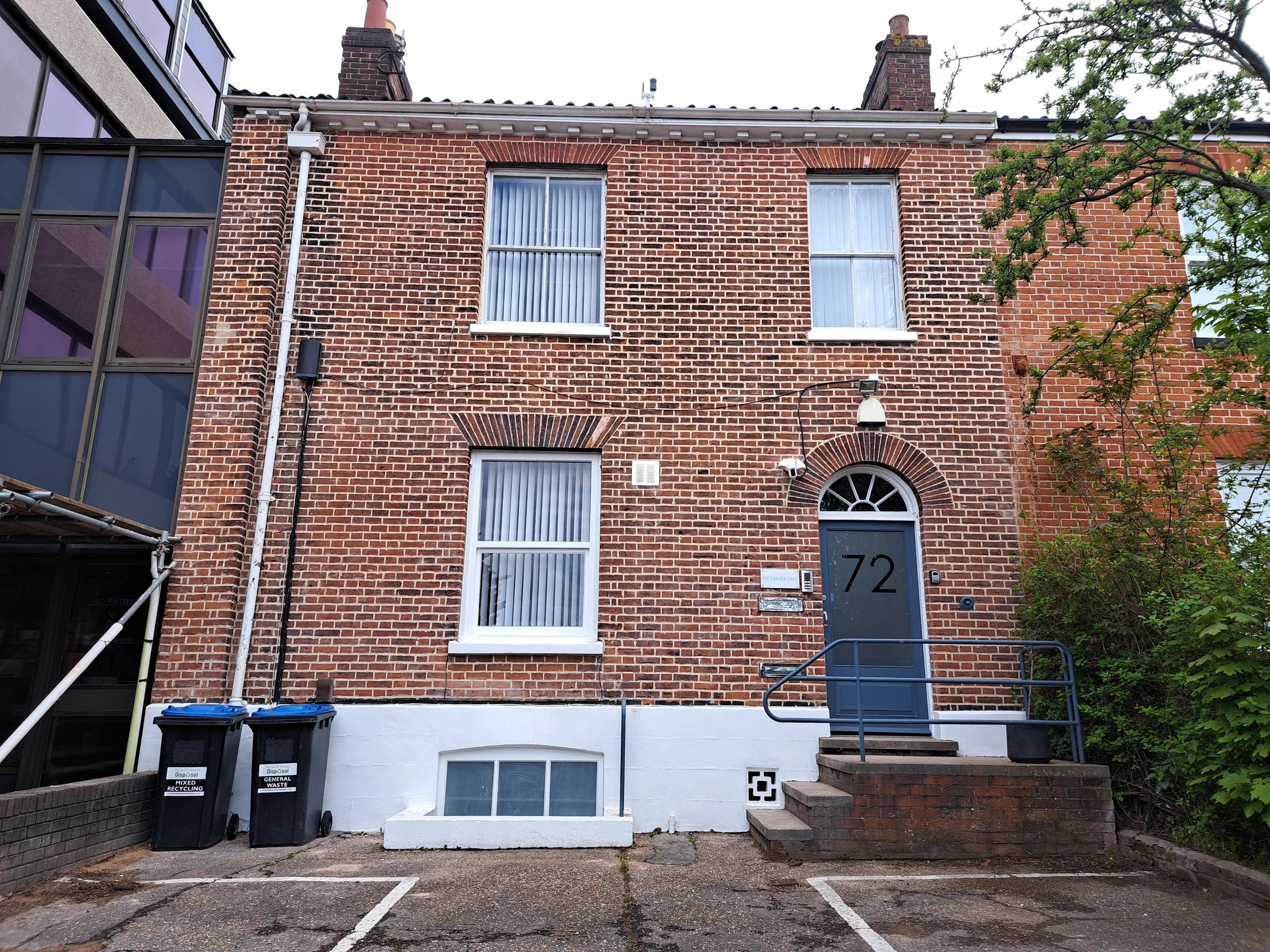 Lime mortar repointing on period brick house in Norwich