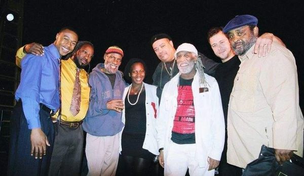 Derek Samuel Reese with the last poets after the show in New Haven Connecticut