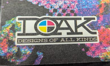 Logo reading 'D O A K Designs of All Kinds' with colorful background.