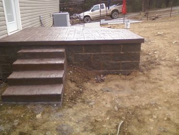 decorative stamped above ground concrete patio, steps and block in White Pine Tennessee