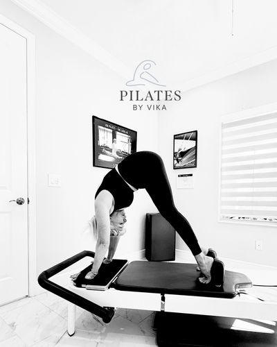 Pilates reformer pose.