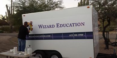 Installation Of Graphics on Wizard Education Trailer.