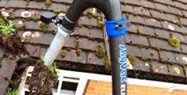 professional gutter cleaner using a skyvac gutter cleaning vacuum in Stoke On Trent