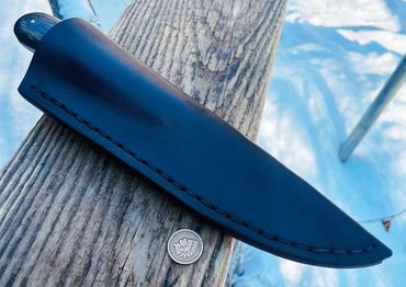 Rustic hand sewn, dark chocolate hand distressed. High ride style. ML Knives