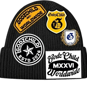 Black beanie with multiple GodzChild patches in yellow, white, and black colors.