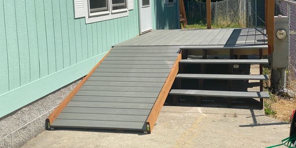 Simple wheel chair ramp, all pressure treated frame with composite decking.