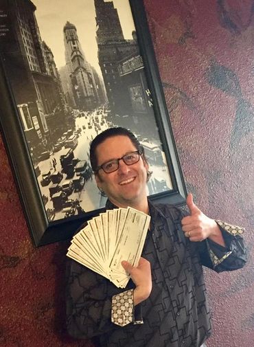 A person holding cheques