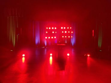 High School DJ in the Olympia area with red Event DJ lights.